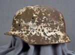 WWII German M40 Snow Camo Battle Damaged Helmet