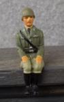 WWII German Toy Seated Soldier 